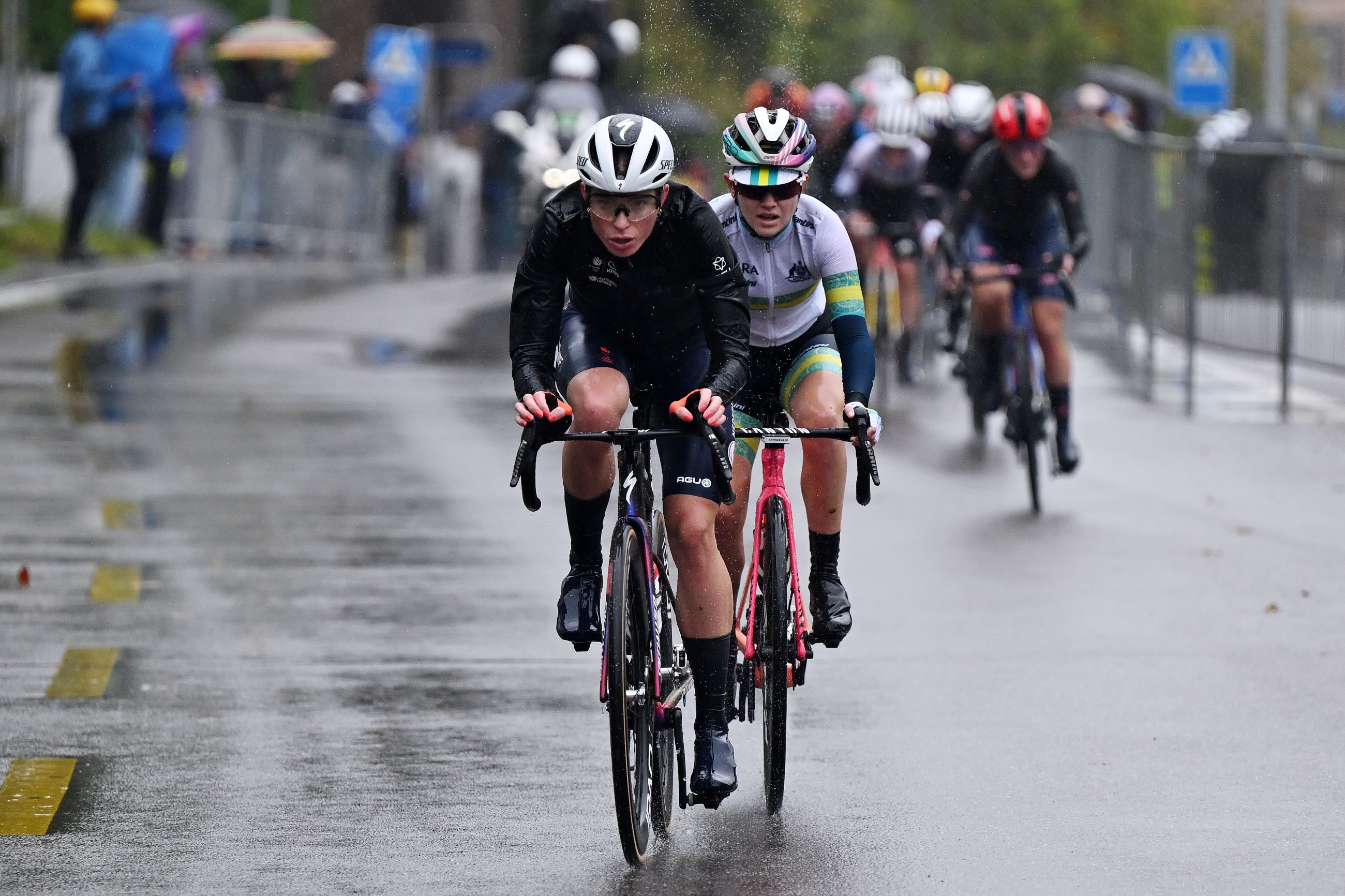 Demi Vollering of the Netherlands and Neve Bradbury of the ARA Australian Cycling Team compete during the 2024 UCI Cycling World Championships, Women's Elite Road Race from Uster to Zurich on September 28, 2024 in Zurich, Switzerland. (Photo by Tim de Waele/Getty Images)